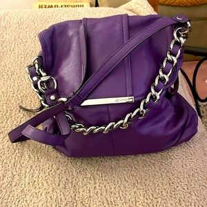 B. Makowsky Tote with Chain Handle and Crossbody Strap. Flap Closure